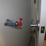 Air horn behind the door, so when it is opened the air horn sounds off.